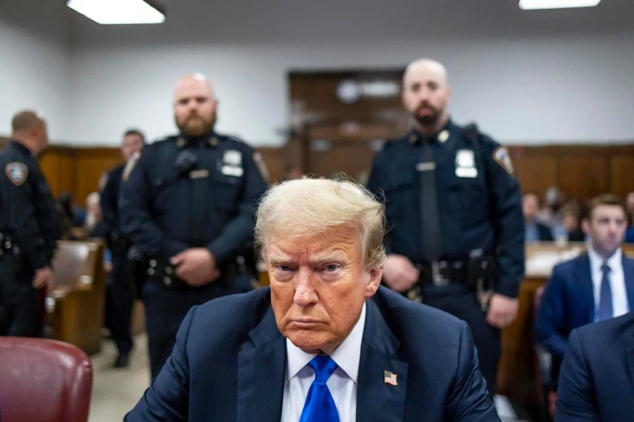 caption: Former U.S. President Donald Trump sits at the defendant's table inside the courthouse as the jury is scheduled to continue deliberations for his hush money trial at Manhattan Criminal Court on May 30, 2024 in New York City.