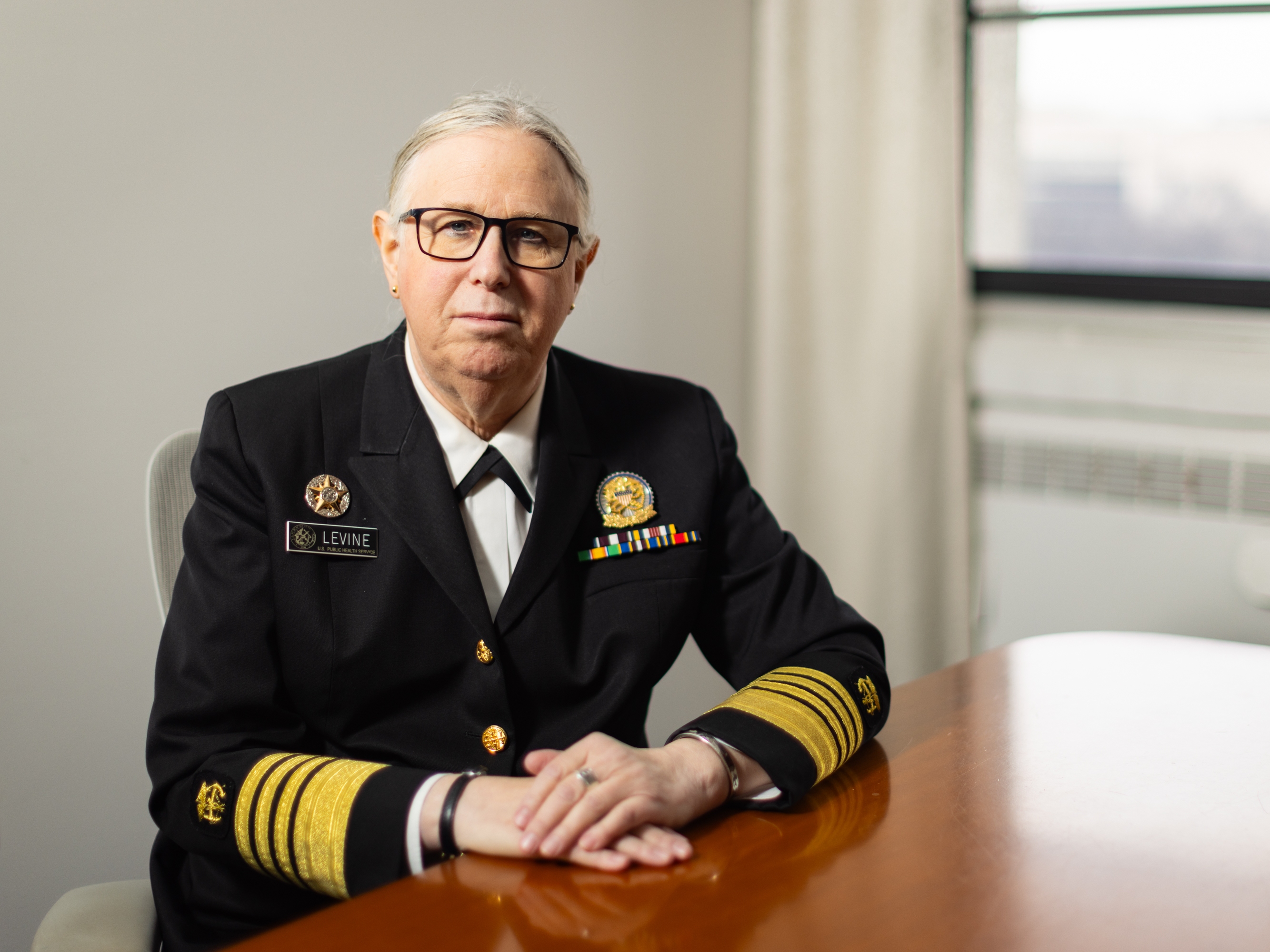caption: Admiral Rachel L. Levine, a pediatrician by training, has been leading the Public Health Service during the Biden administration. She's pictured in a conference room at HHS headquarters in Washington, D.C.