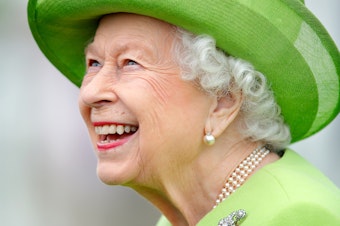 caption: Queen Elizabeth II attends the Out-Sourcing Inc. Royal Windsor Cup polo match and a carriage driving display by the British Driving Society at Guards Polo Club, Smith's Lawn on July 11, 2021 in Egham, England.