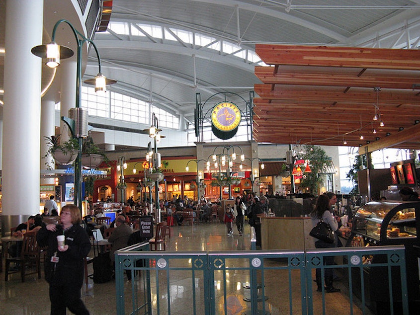 caption: The food court in the SeaTac concourse is a battleground for a proposed minimum wage increase.