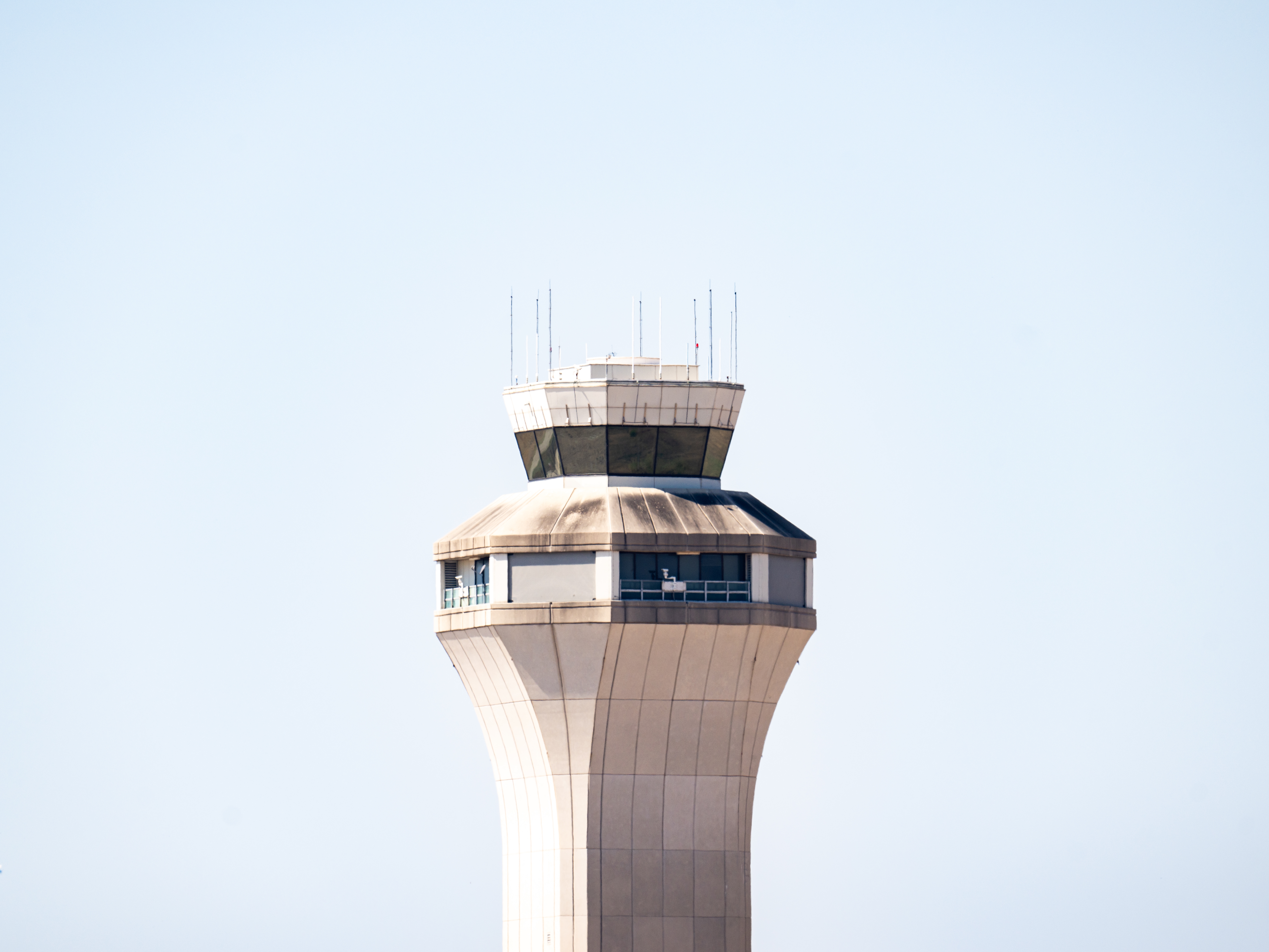 caption: An air traffic control tower is seen Wednesday following the government shutdown at the Austin-Bergstrom International Airport in Austin, Texas. The U.S. government has shut down after Congress failed to pass short-term funding. Nearly seven years ago, air traffic controllers may have helped play ending the last government shutdown.