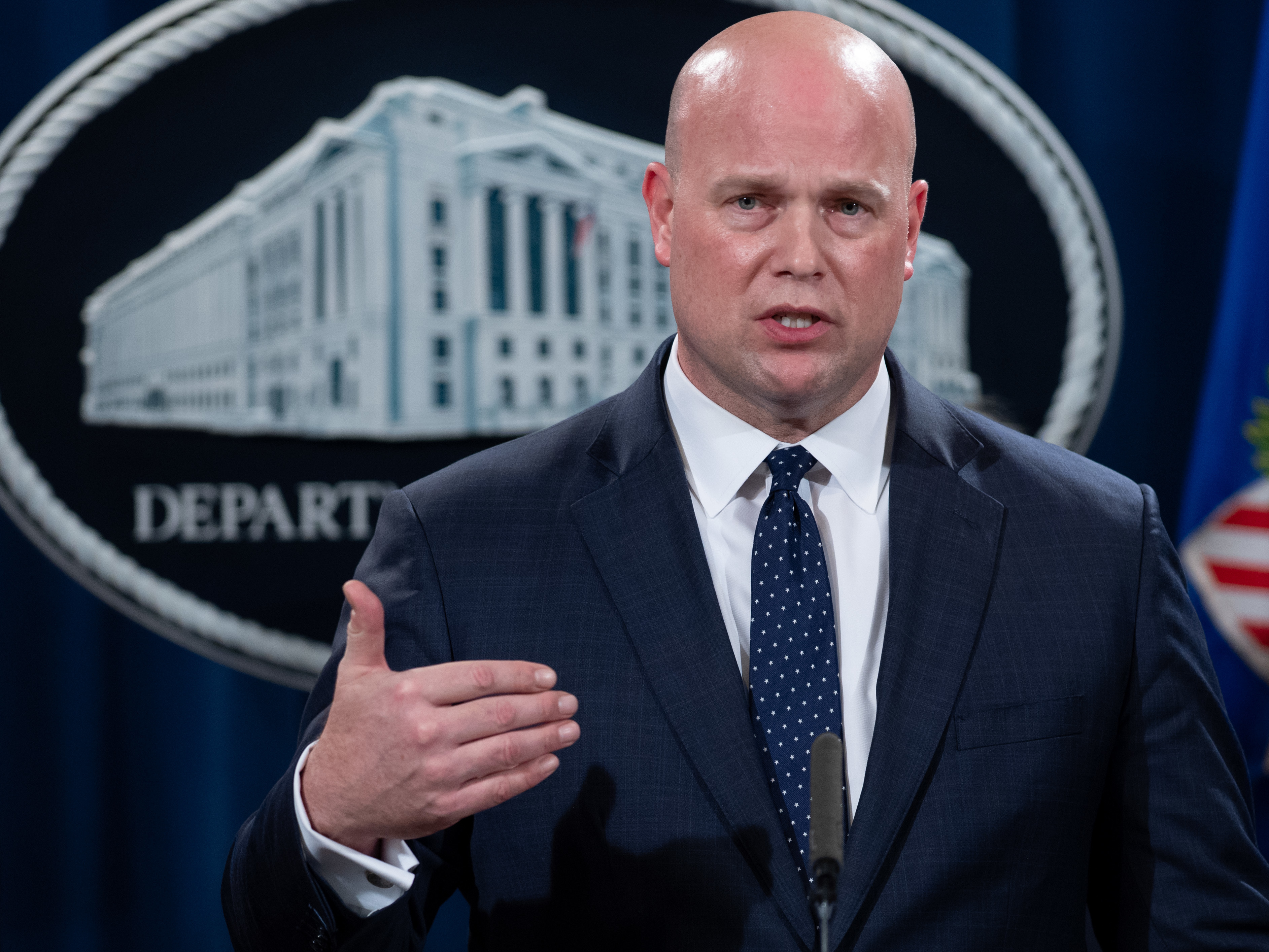 caption: Acting Attorney General Matthew Whitaker speaks during a press conference at the Department of Justice in Washington, D.C., Monday.