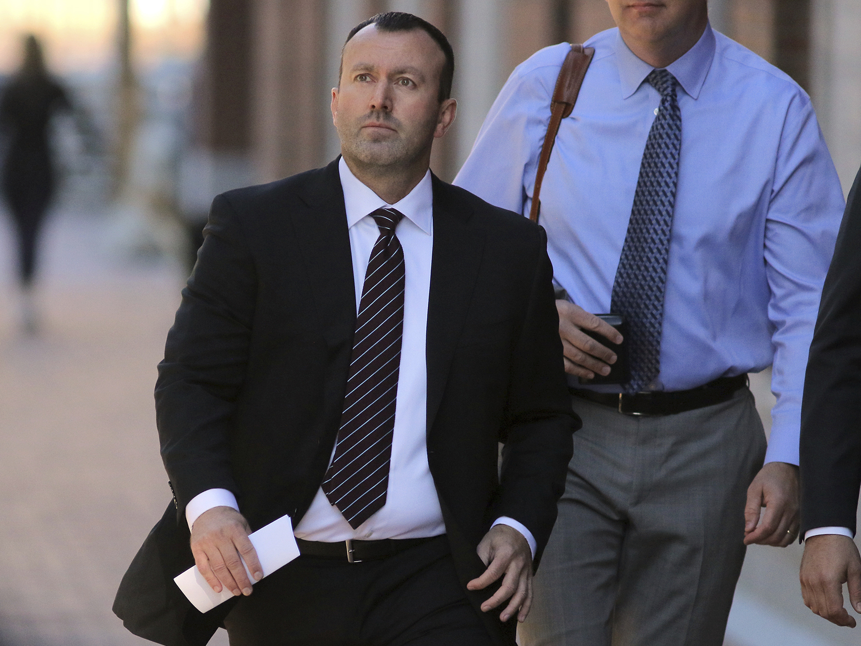 caption: eBay former Senior Director of Safety and Security James Baugh arrives for his sentencing in a cyber stalking case at Moakley Federal Court on Thursday, Sept. 29, 2022, in Boston.