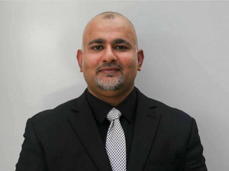 caption: Majid Khan, a 42-year-old Pakistani man, was released from the U.S. military prison in Guantánamo Bay, Cuba, on Thursday. Pictured here in 2022, he was sent to Belize after suing for unlawful imprisonment.