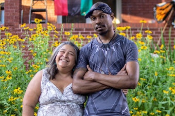 caption: Elizabeth Vega, left, and Jamell Spann became friends after Vega comforted an emotional Spann while they were protesting in Ferguson, Mo., as strangers in 2014.