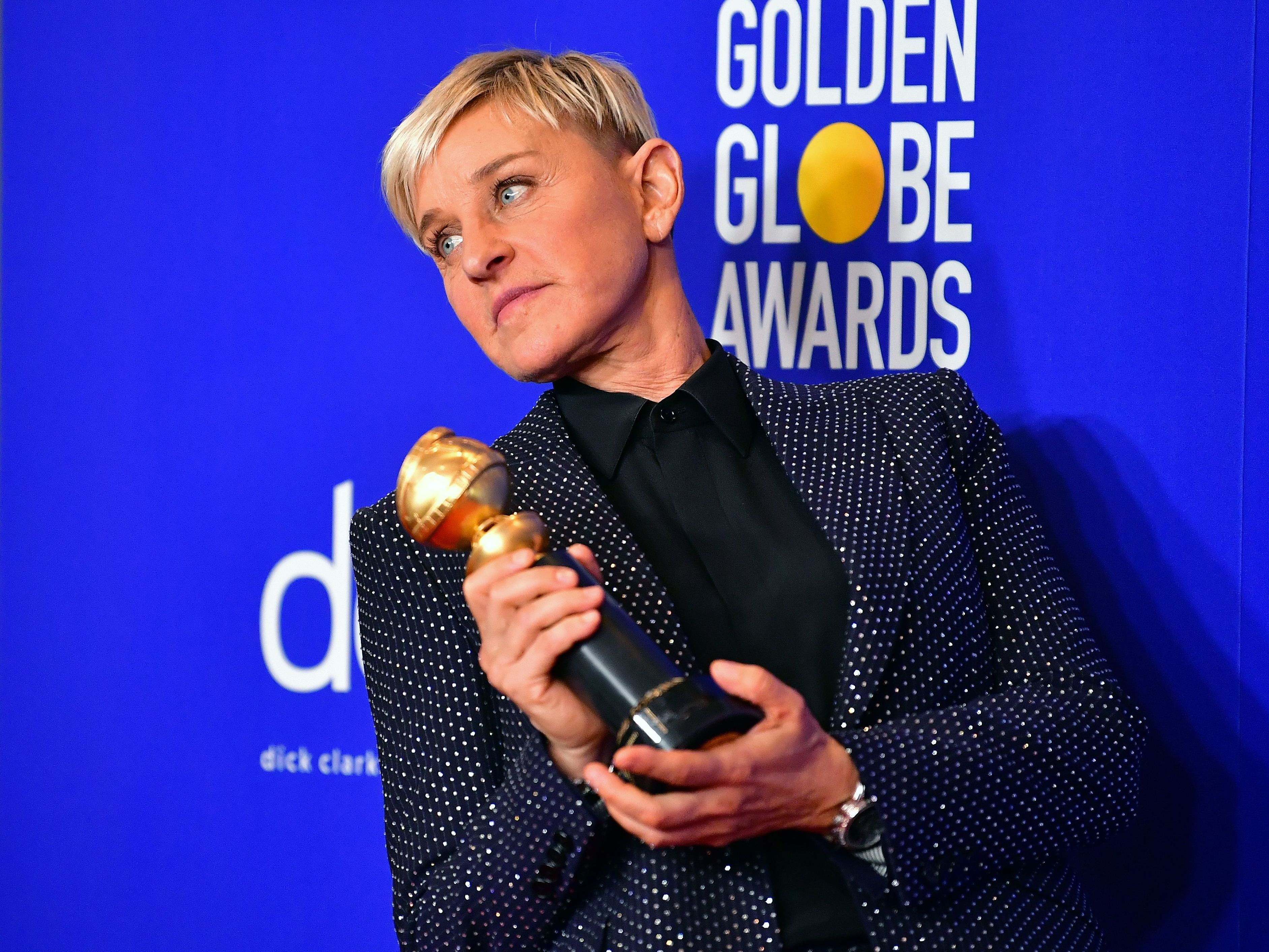 caption: Ellen DeGeneres, posing at the Golden Globe Awards in January.