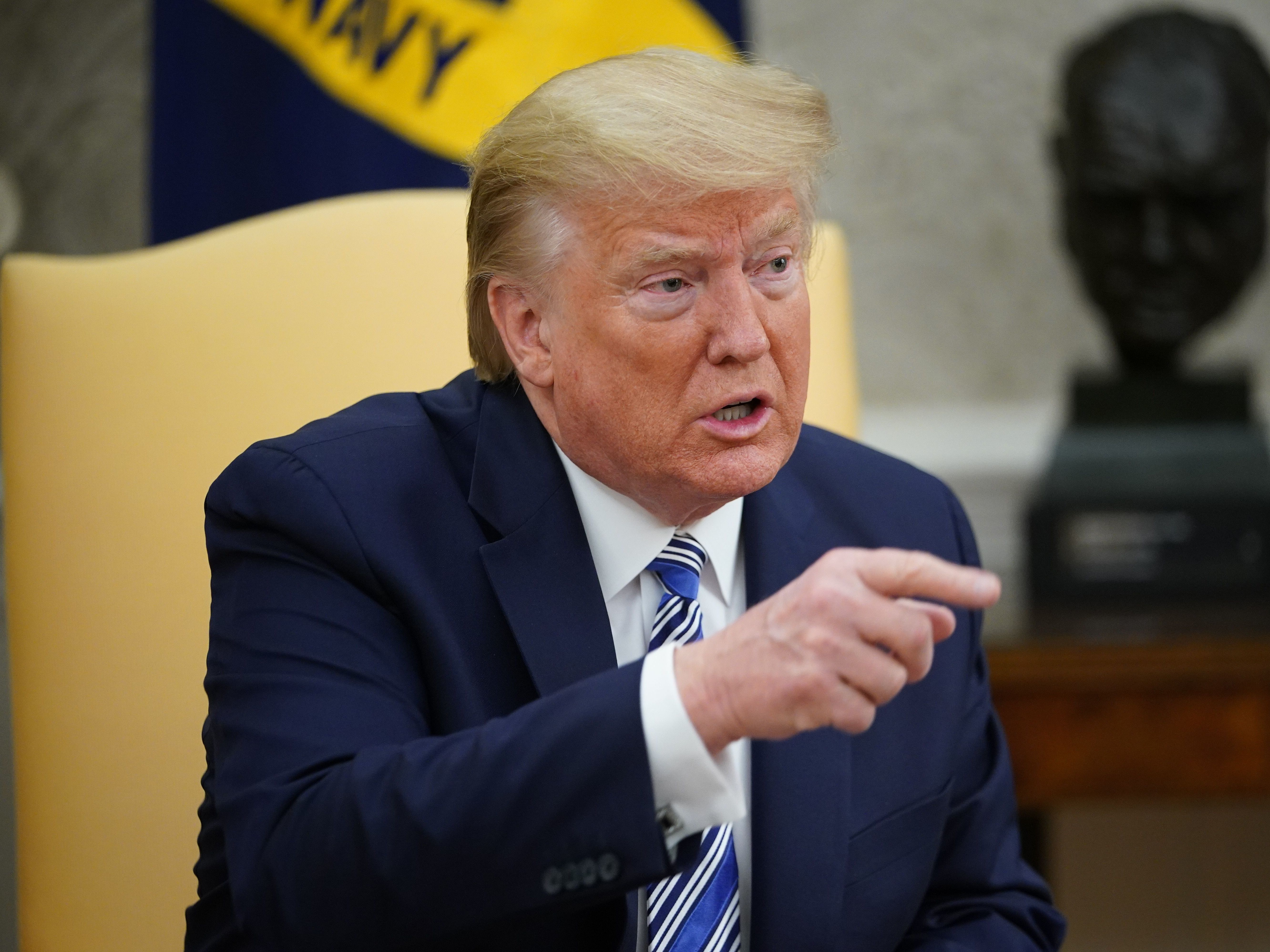 caption: President Trump plans to use the Defense Production Act to keep meat plants running. Workers at the plants have been pushing for more protection from the virus.