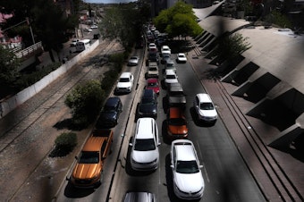 caption: Cars line up outside the Dennis DeConcini Port of Entry in Nogales, Sonora, Mexico.