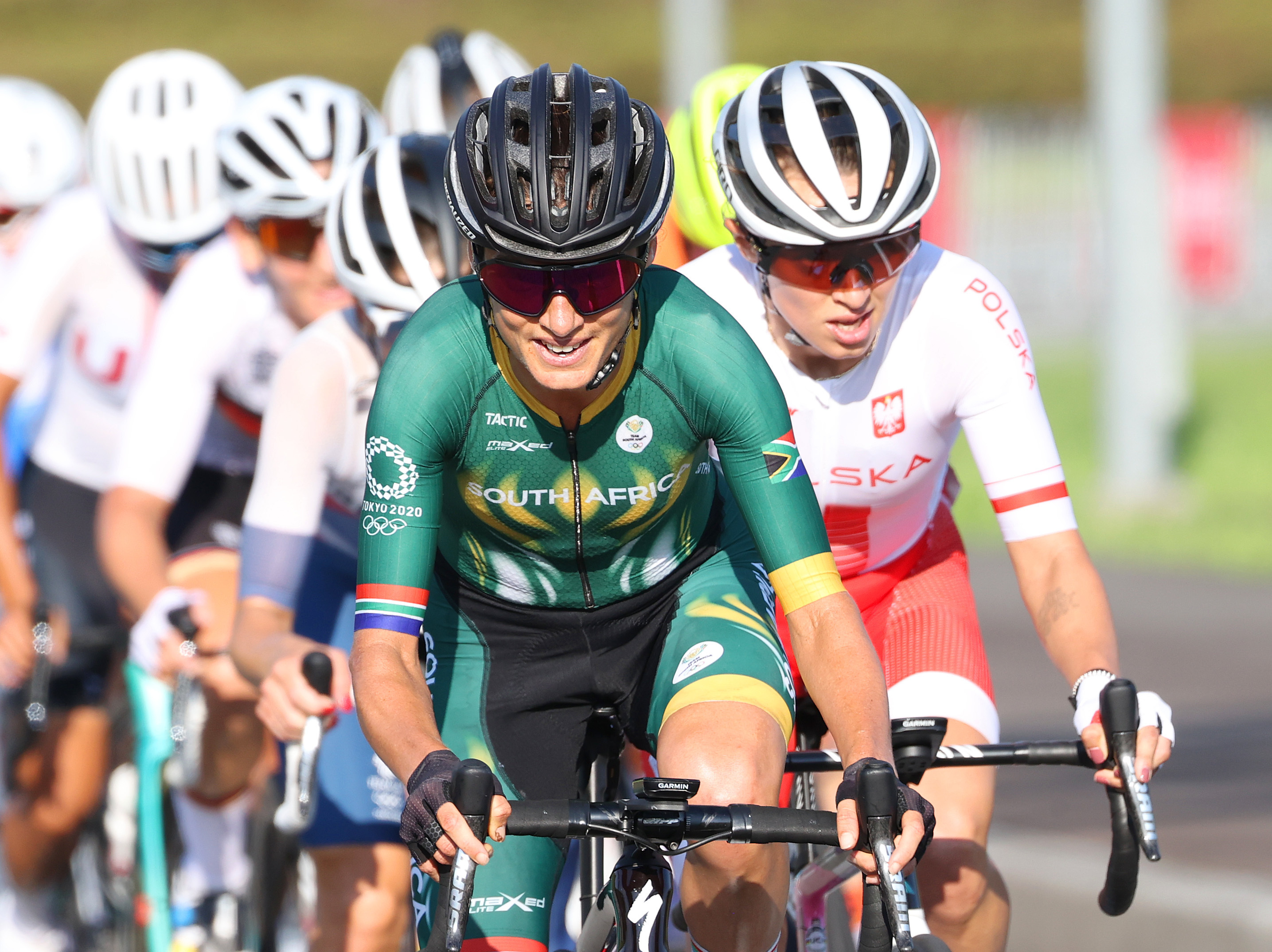 caption: Ashleigh Moolman-Pasio of Team South Africa leads the peloton during the women's road race on the second day of the 2020 Olympic Games at Fuji International Speedway on July 25, 2021 in Oyama, Shizuoka, Japan.