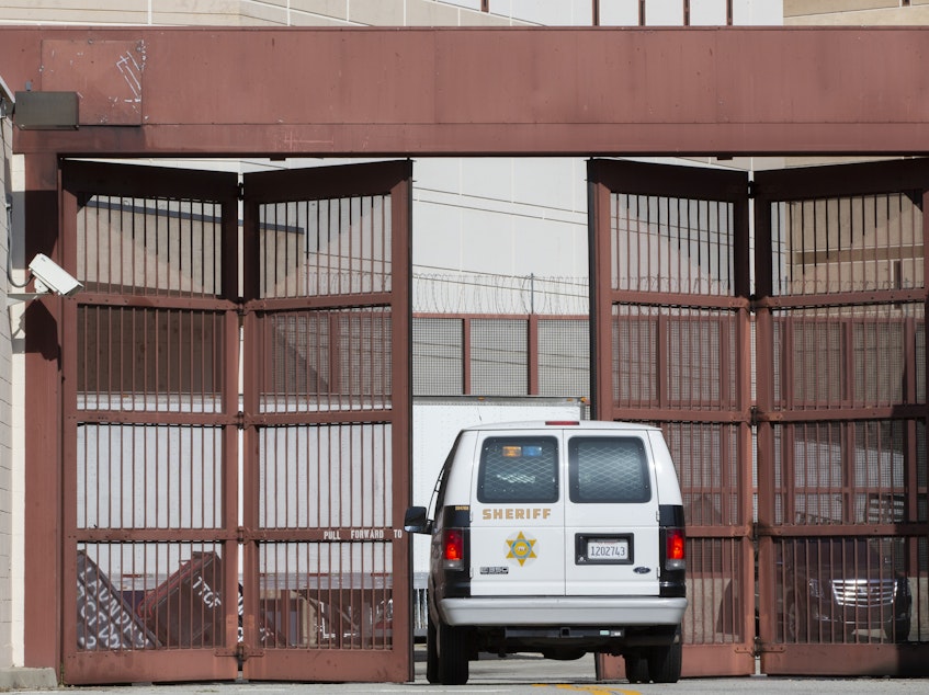 caption: A Los Angeles County Sheriff's Department van enters the Twin Towers Correctional Facility in Los Angeles on April 1, 2020. California is planning to release as many as 3,500 inmates who were due to be paroled in the next two months as it tries to free space in cramped prisons in anticipation of a coronavirus outbreak, state officials said.