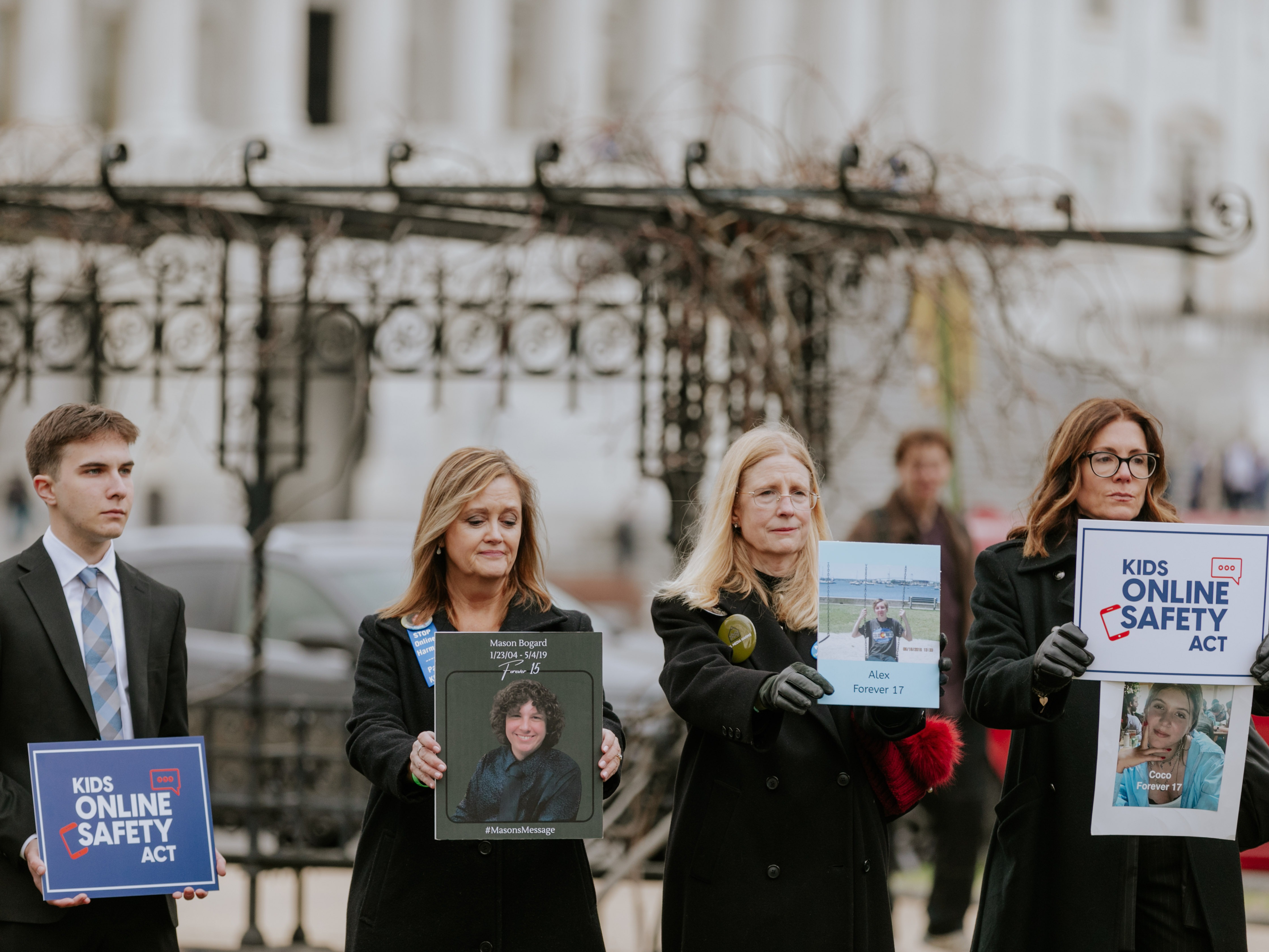 caption: Members of advocacy group Parents for Safe Online Space rally after a hearing on Capitol Hill in January. The group supports proposed legislation that will hold tech companies accountable for limiting children's exposure to harmful online content.