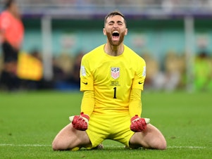 caption: Matt Turner of the United States celebrates the winning goal by Christian Pulisic against Iran at the World Cup on Tuesday.