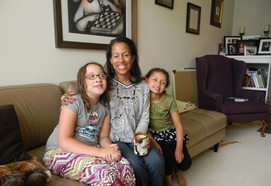 caption: April Nowak takes her daughters Camille and Simone to play dates with other brown girls in the Puget Sound area.