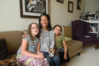 caption: April Nowak takes her daughters Camille and Simone to play dates with other brown girls in the Puget Sound area.