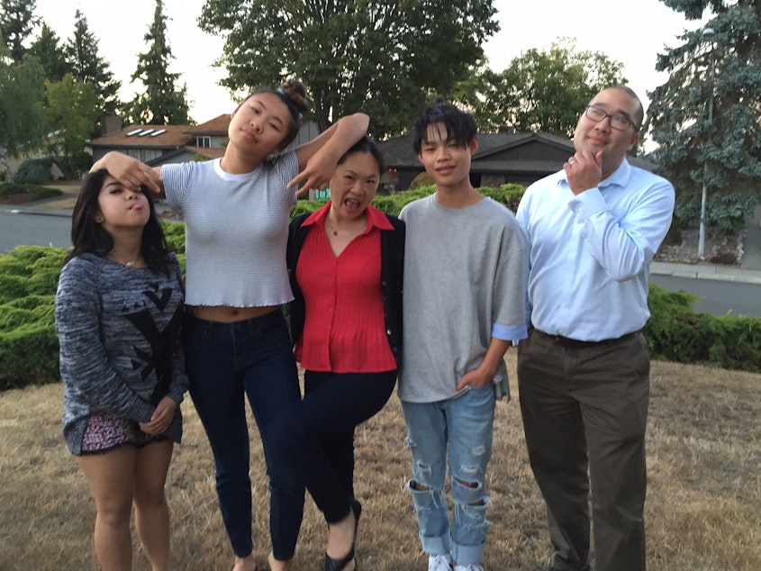 caption: April Reyes (far left) with the family who took her in. From left to right: Mariya Manuel, Tanya Kim, Tamar Manuel and Alan Lee