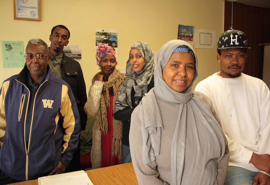caption: Sahra Farah and volunteers at the Somali Community Center hope development around Rainier Beach station will bring jobs to the neighborhood, where she says young people struggle to find employment.