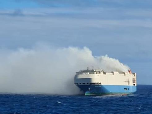 caption: In this image posted on the Portuguese navy's website, the Felicity Ace is shown burning on Thursday in the Atlantic Ocean about 90 nautical miles southwest of the island of Faial in the Azores.