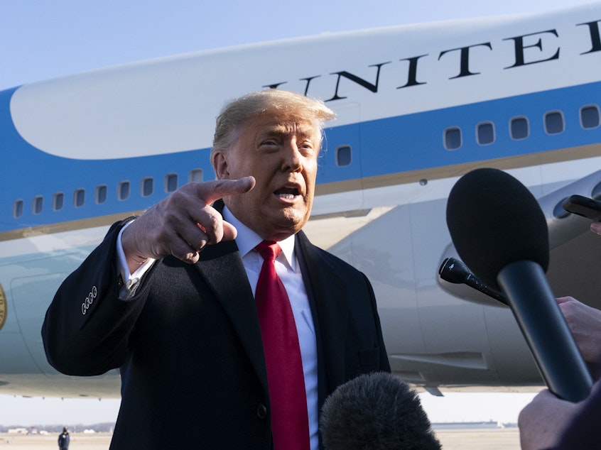 caption: President Trump speaks to reporters before boarding Air Force One on Tuesday. Trump denied culpability for the violence and expressed no regret for comments made last week that many have criticized as being a catalyst for mob violence at the U.S. Capitol.