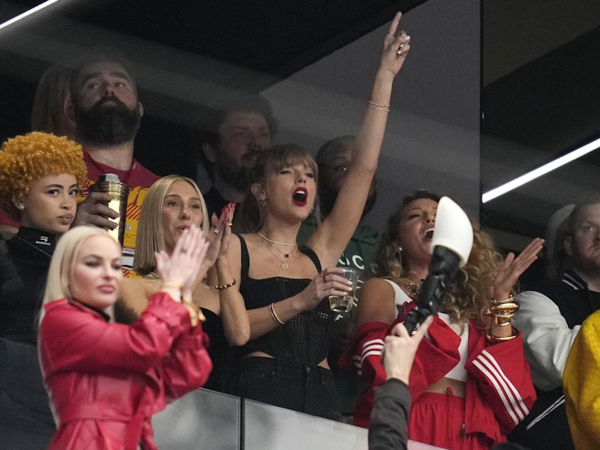 caption: Taylor Swift attends the Super Bowl 58 in Las Vegas on Sunday.