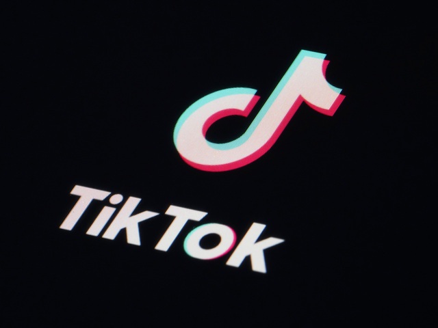 caption: The icon for the TikTok video sharing app is seen on a smartphone in Marple Township, Pa., on Tuesday, Feb. 28, 2023.