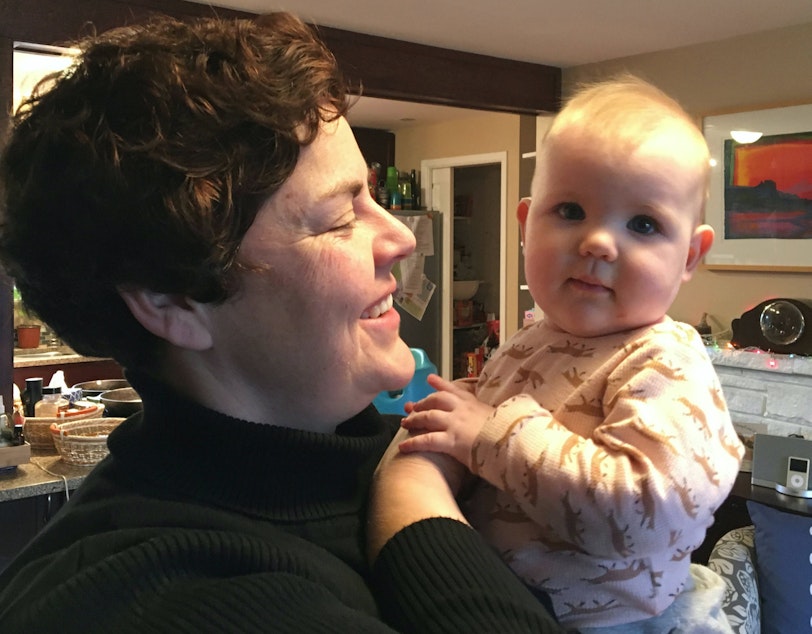 caption: Megan Moffat Sather and her daughter, Winslow