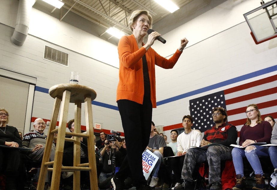 caption: Democratic presidential candidate Sen. Elizabeth Warren, D-Mass., speaks during a campaign event in Marshalltown, Iowa, on Sunday.