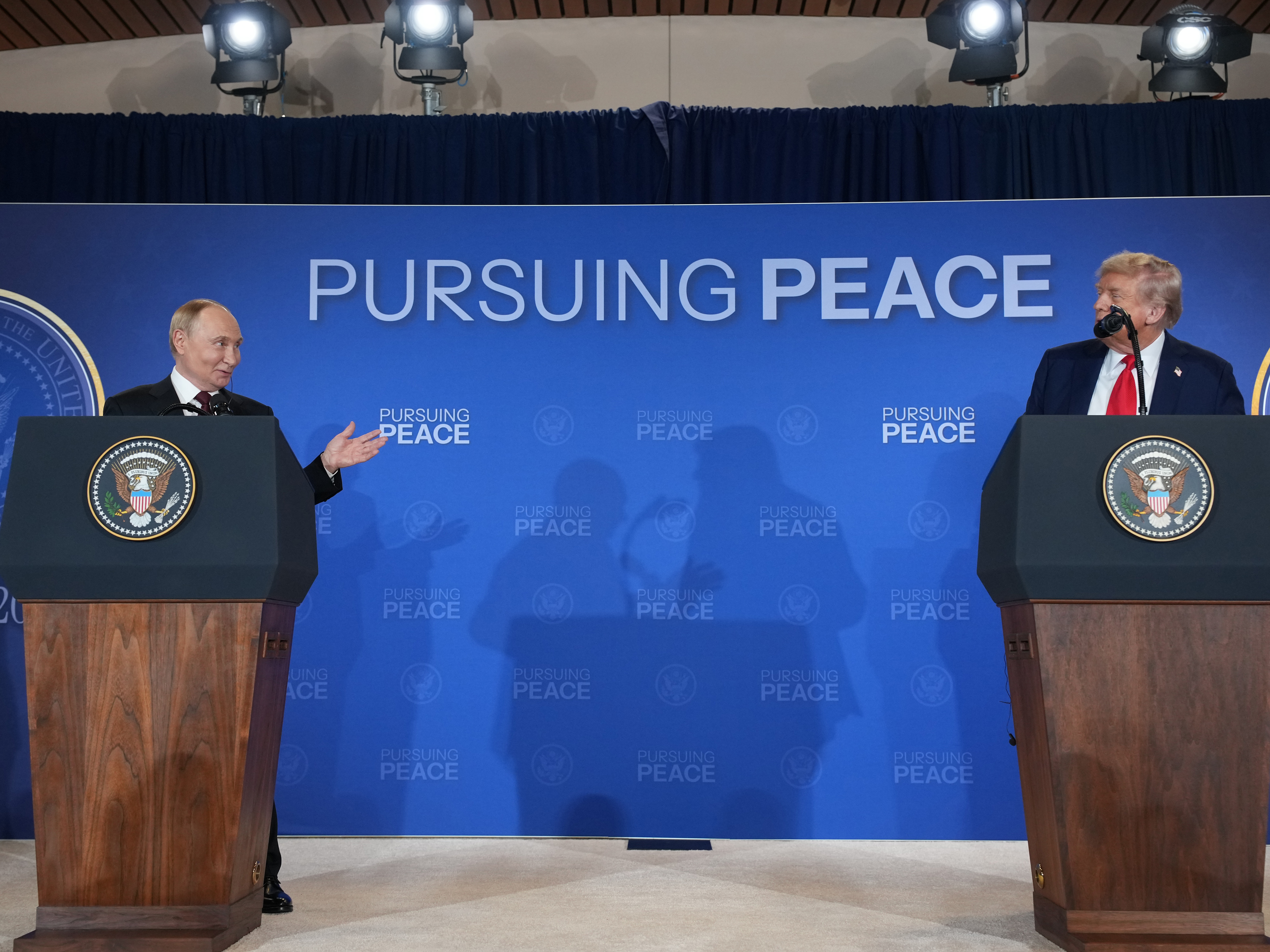 caption: President Trump and Russian President Vladimir Putin hold a press conference at Joint Base Elmendorf-Richardson in Anchorage, Alaska on Friday after a day of talks aimed at ending the war in Ukraine.