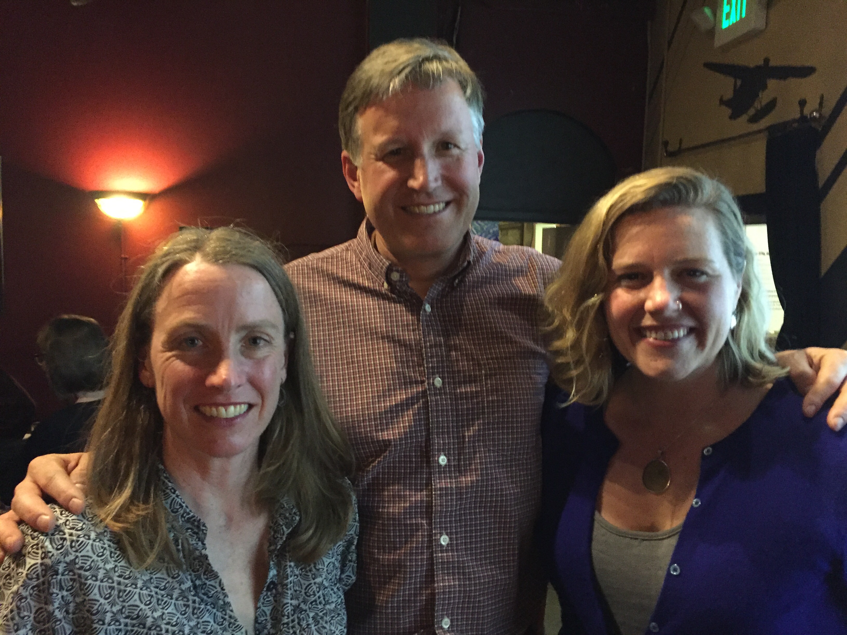caption: L to R: Amy Snover, Mike O'Brien and Ashley Ahearn at Naked City Brewery