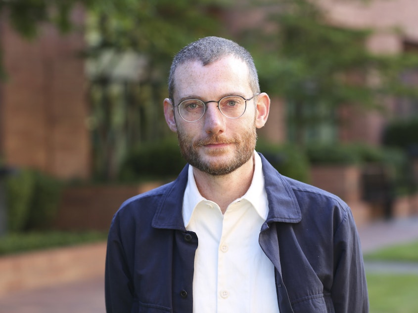 caption: Trevor Bedford, a computational virologist, has been named a MacArthur Fellow for his work on SARS-CoV-2. His early reaction: "Scary."