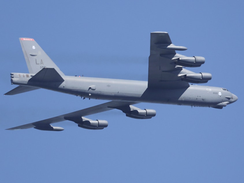 caption: A U.S. Air Force B-52 bomber flies during the Seoul International Aerospace and Defense Exhibition 2023 at Seoul Air Base in Seongnam, South Korea, on Oct. 17, 2023.
