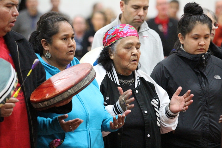 caption: The Tulalip Tribe leaders perform at Marysville-Pilchuck High School on Sunday, Oct. 26, 2014 -- two days after Jaylen Fryberg shot five students and himself in the cafeteria during lunch.