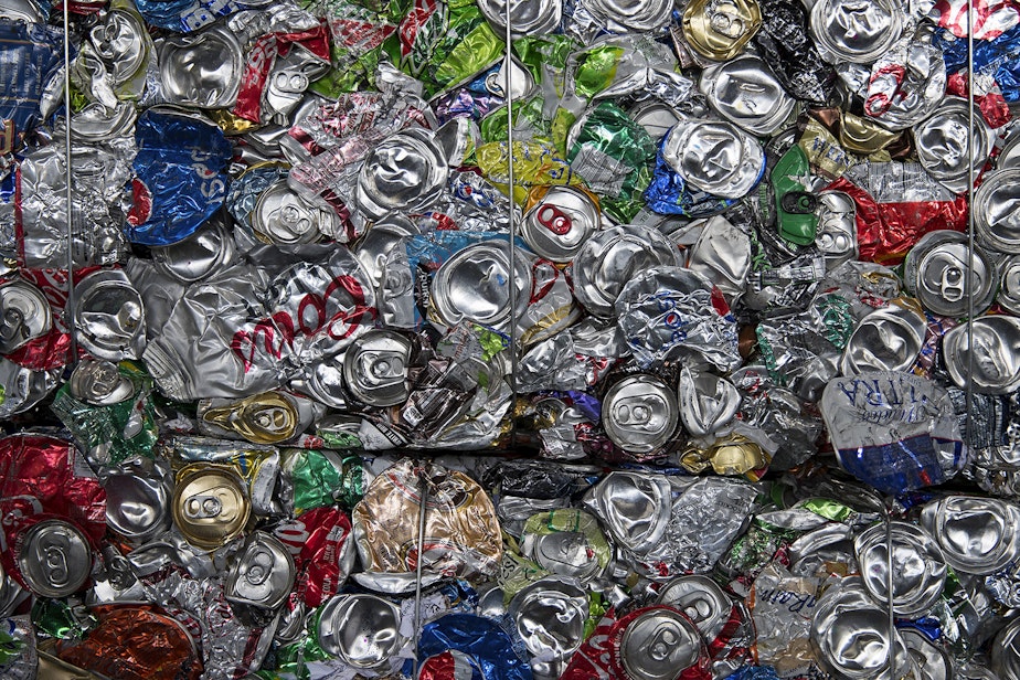 caption: A bale of flattened soda cans is shown on Friday, October 26, 2018, at Cascade Recycling Center in Woodinville. 