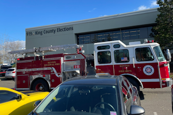 caption: Firefighters respond to suspicious envelopes mailed to the King County Elections office in Renton, Wednesday, Nov. 8, 2023, the day after the November general election. 