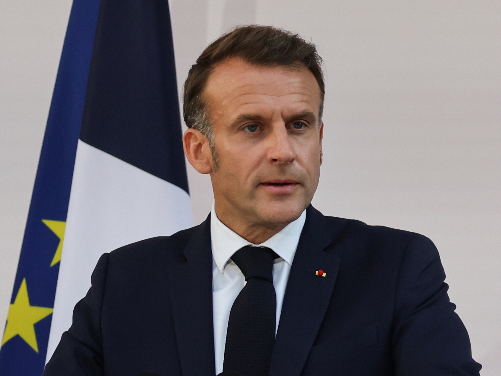 caption: French President Emmanuel Macron speaks to the army leaders at the Hotel le Brienne on  July 13.