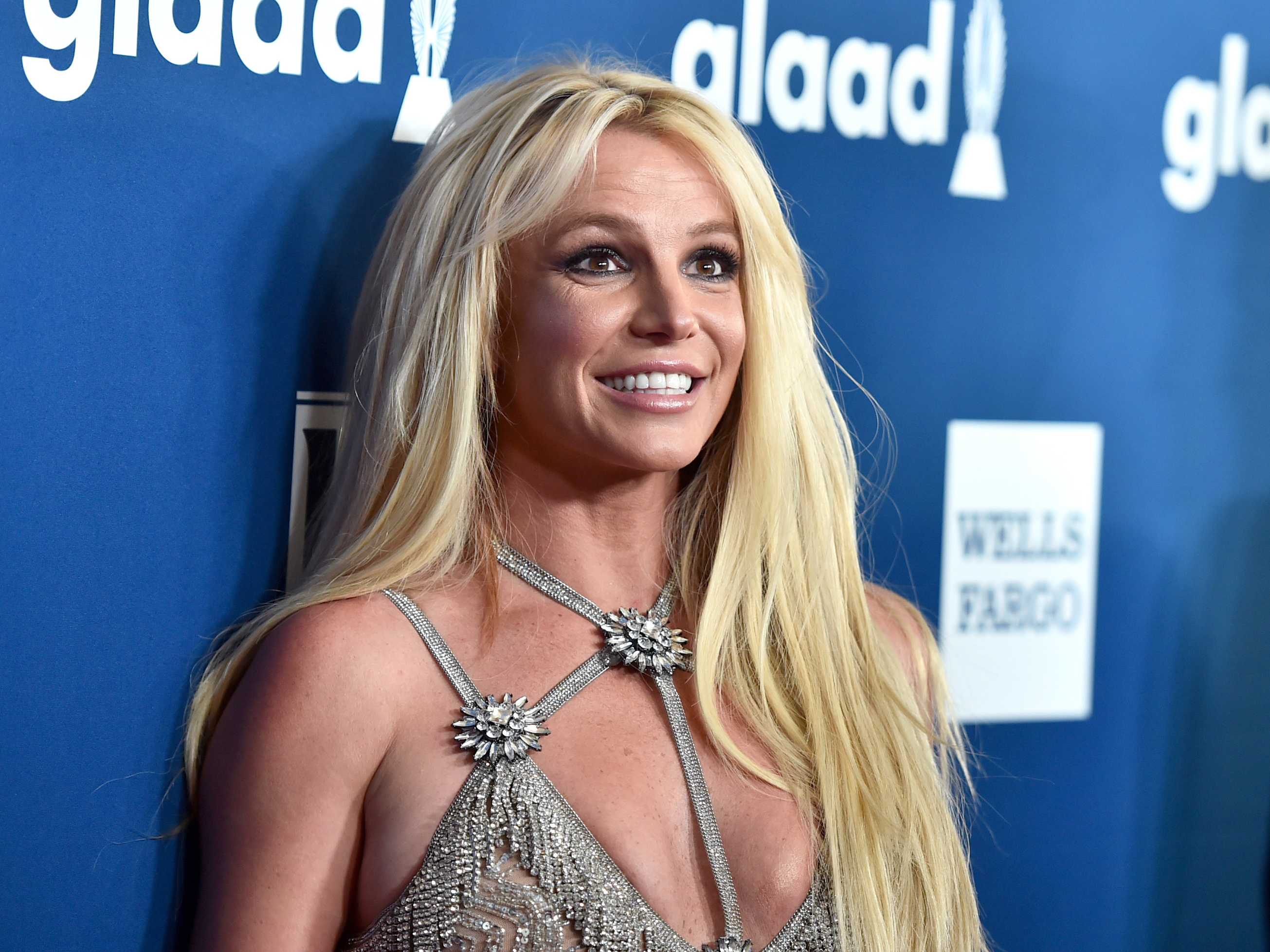caption: Britney Spears, seen here at an awards event in April 2018, has renewed the debate over conservatorships, with lawmakers on both sides of the aisle expressing support for the pop star.