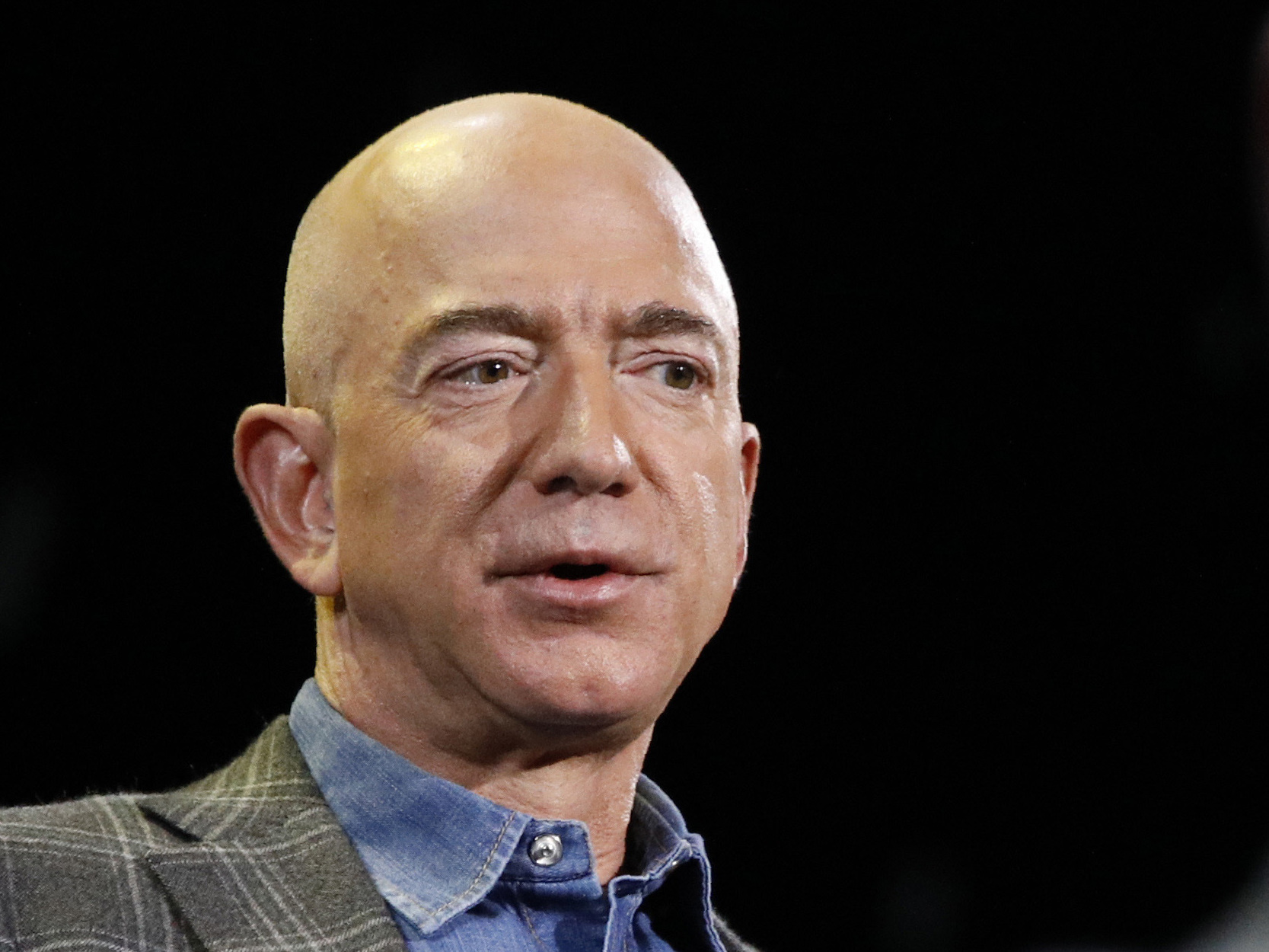 caption: Jeff Bezos stepped down on as CEO of Amazon on Monday and is handing the reins to his longtime deputy Andy Jassy.