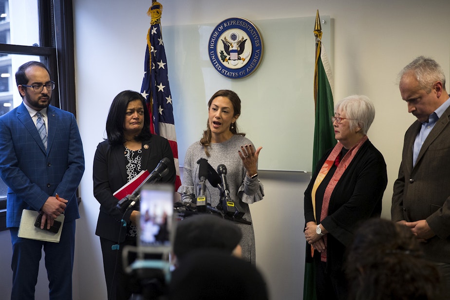 caption: Negah Hekmati, 38, speaks during a press conference detailing her 5-hour delay returning to the U.S. from Canada with her family, at Rep. Pramila Jayapal's office on Monday, January 6, 2020, in downtown Seattle.