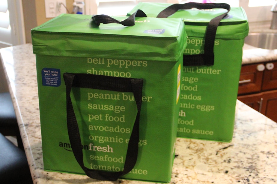 caption: Amazon Fresh delivery bags.