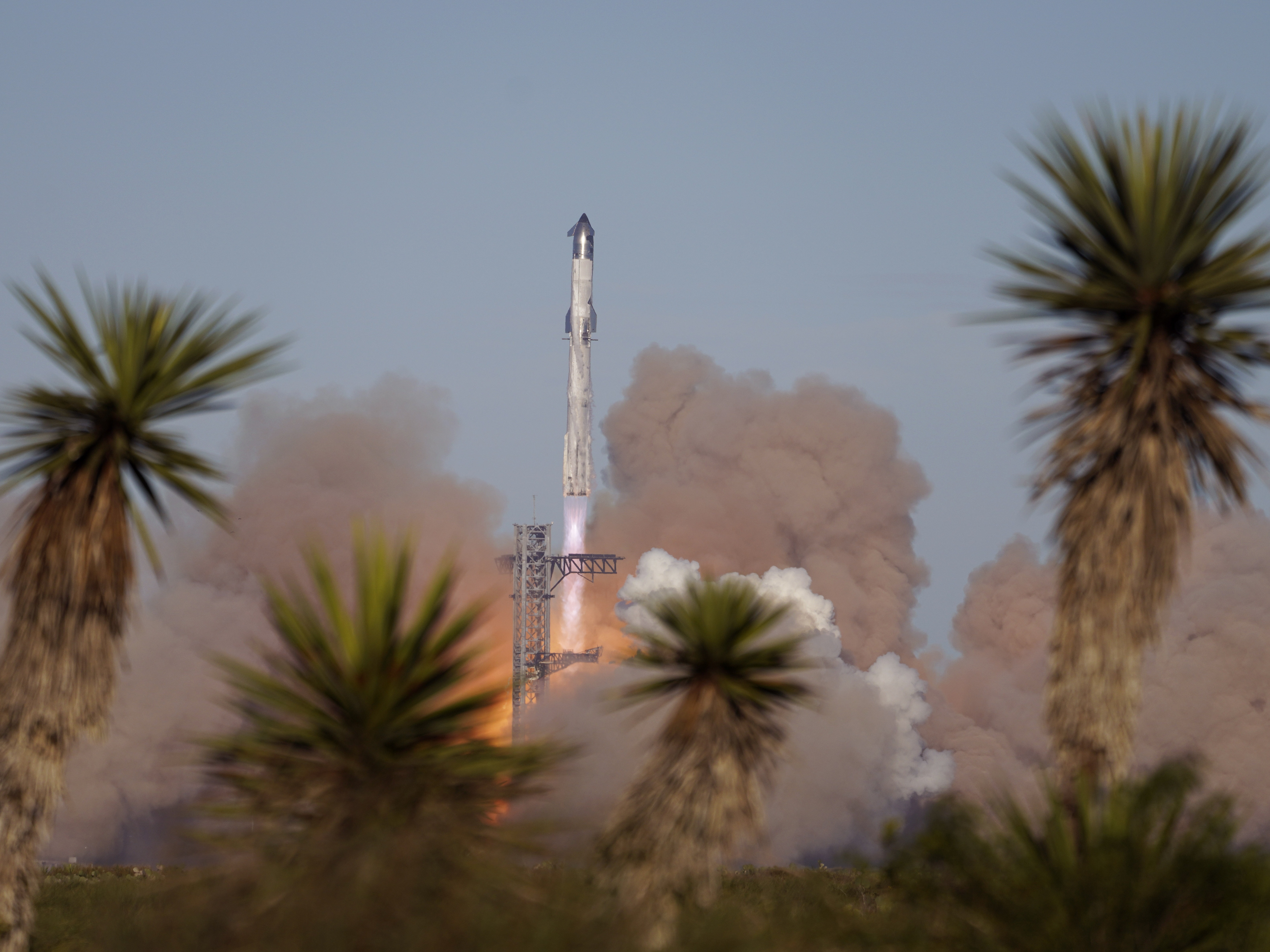 caption: SpaceX's mega rocket Starship launches for a test flight from Starbase in Boca Chica, Texas, on Thursday.
