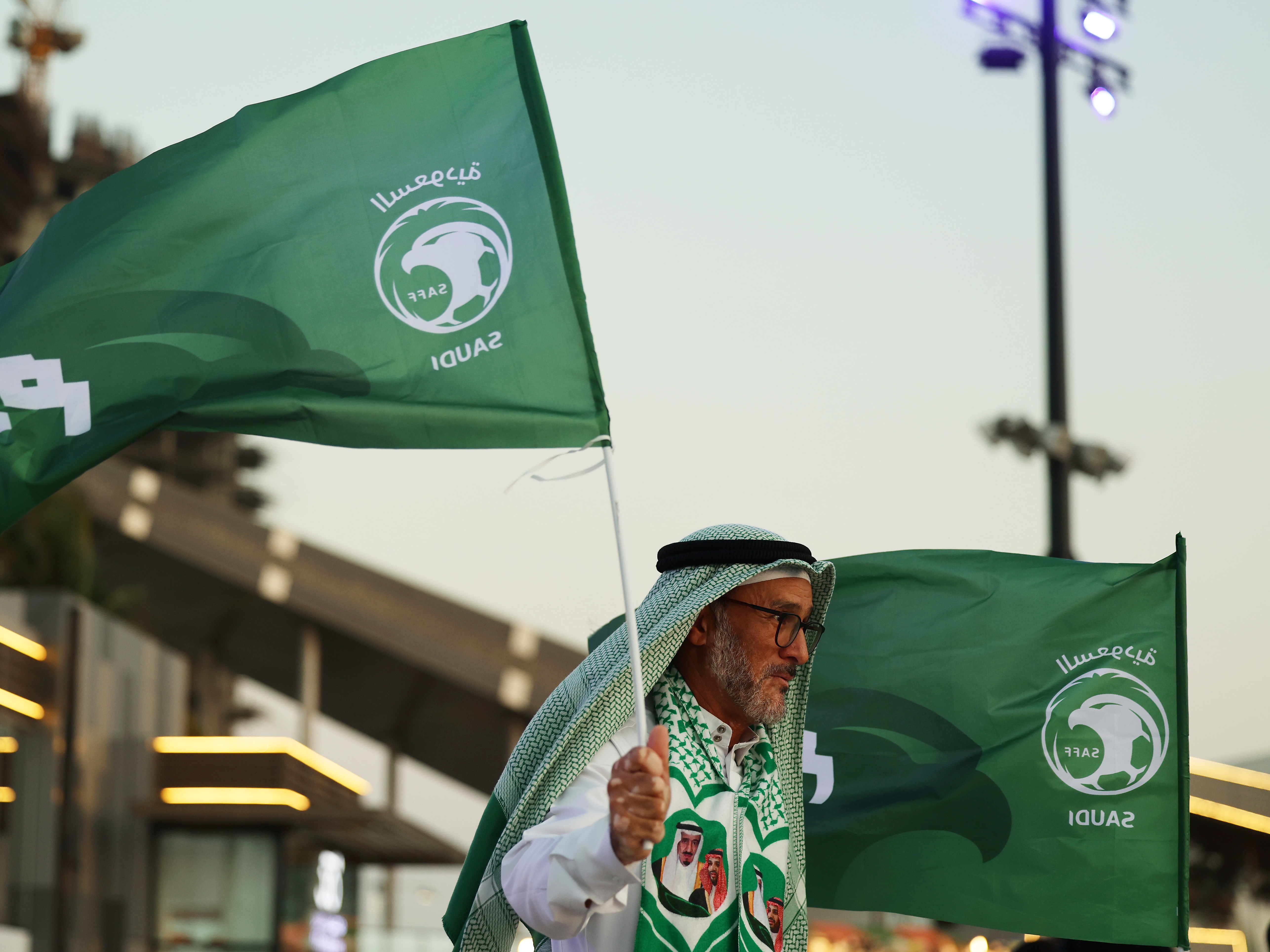 caption: People celebrated in Jeddah as Saudi Arabia was announced Wednesday as the host of the 2034 FIFA World Cup.