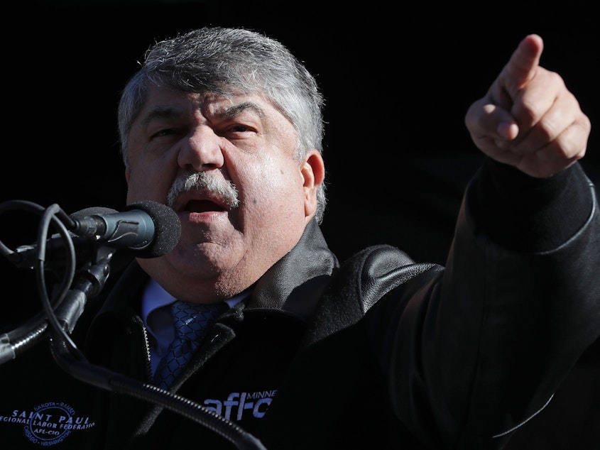 caption: AFL-CIO leader Richard Trumka addresses a 2019 rally in Washington, D.C. He had been president of the federation since 2009.