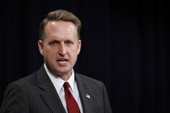 caption: Former acting Assistant Attorney General for Civil Rights John Gore speaks at the Justice Department in 2018 in Washington, D.C. Gore and other Trump administration officials are accused of providing false or misleading statements about the origins of a citizenship question they tried to get on the 2020 census.