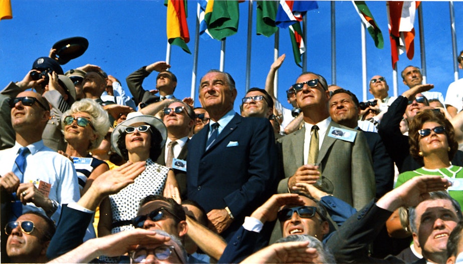 caption: Vice President Spiro Agnew and former President Lyndon B. Johnson view the liftoff of Apollo 11.