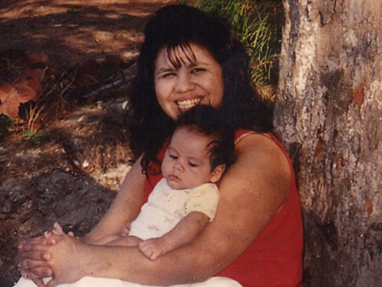 caption: In an undated photo, Melissa Lucio is pictured with one of her young children.