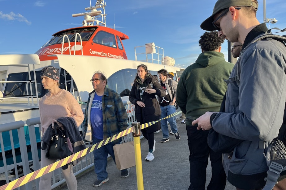 caption: Foot ferry passengers disembark in Bremerton