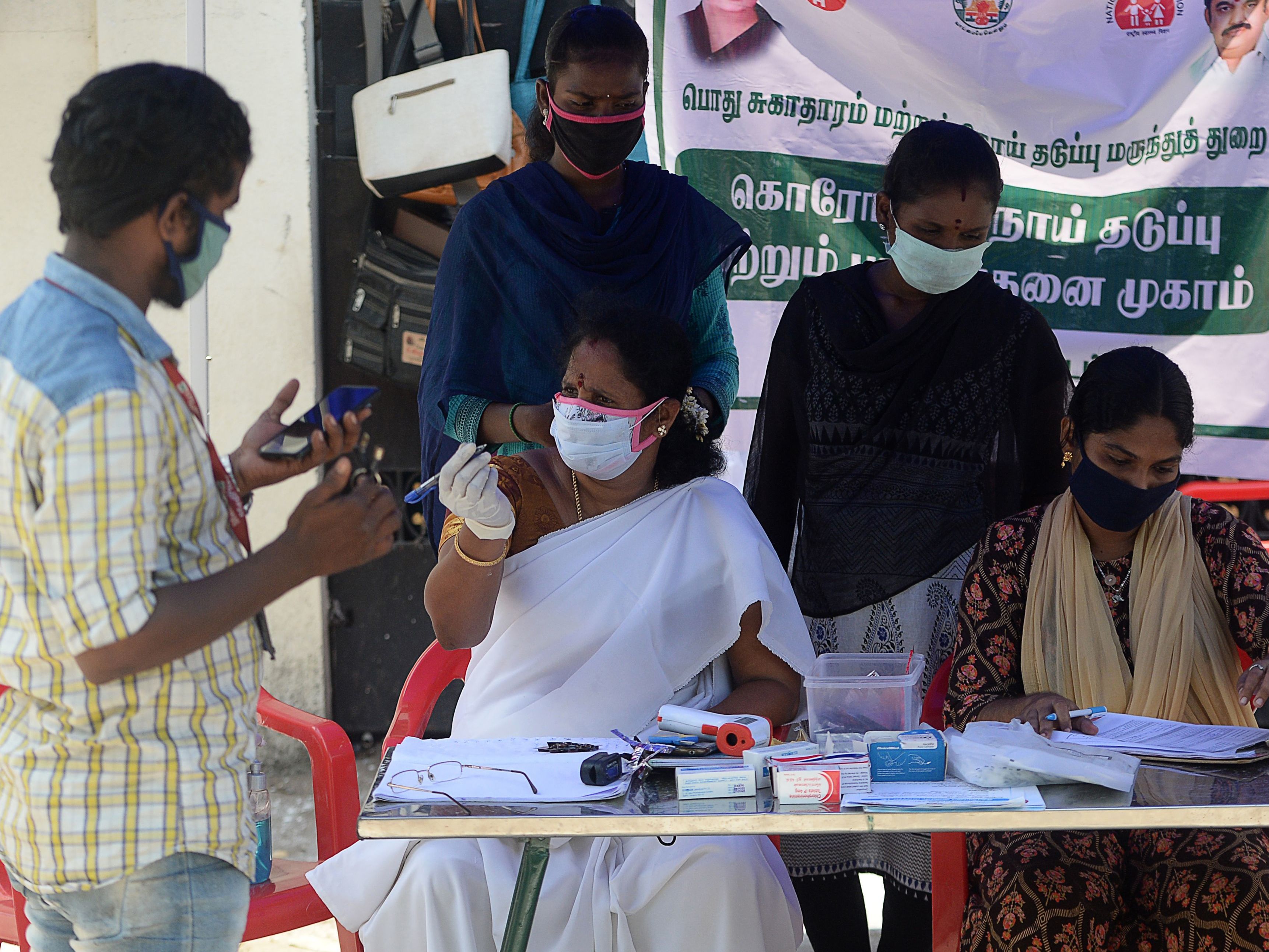 caption: <a href="https://coronavirus.jhu.edu/region/india">India</a> recorded 78,761 new coronavirus cases on Saturday, helping to push the global total past 25 million on Sunday.