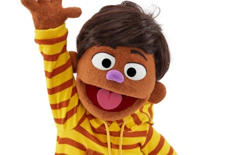 caption: TJ is <em>Sesame Street</em>'s first Filipino muppet.