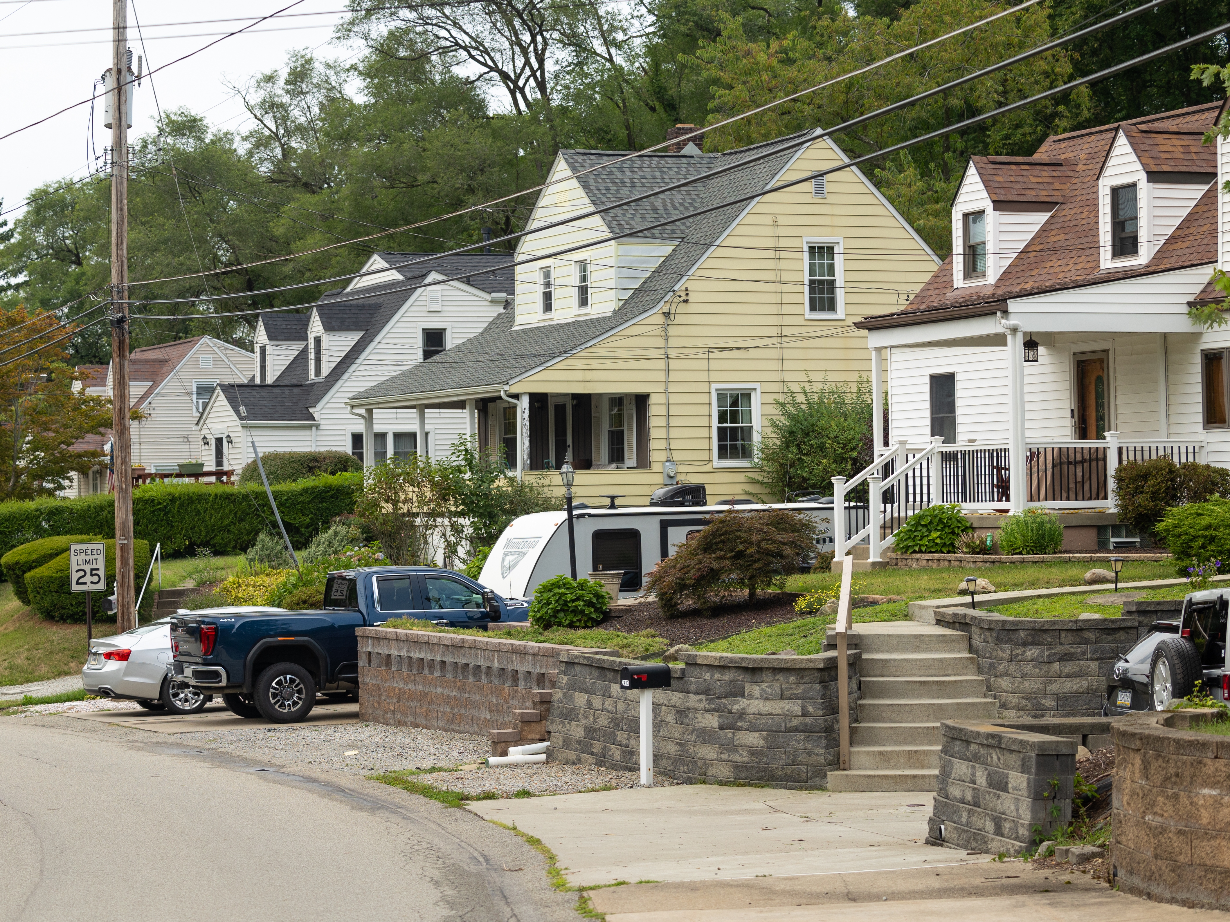caption: In the Bethel Park community where the shooter lived, residents tend to keep to themselves. 