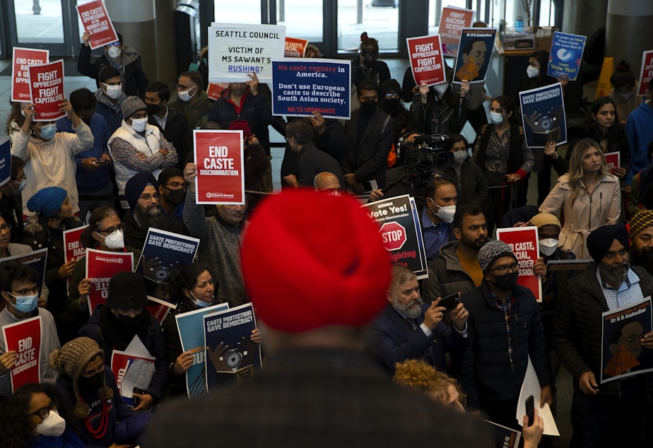 caption: Both supporters and opposers gathered for rally ahead of a Seattle city council vote on a measure sponsored by councilmember Kshama Sawant that would ban discrimination based on caste, on Tuesday, February 21, 2023, at Seattle City Hall. 