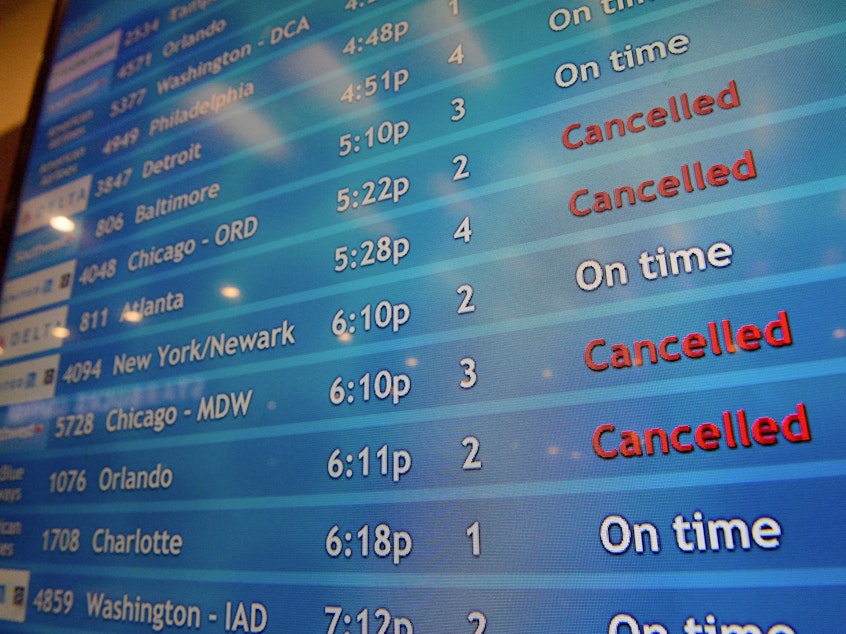 caption: A screen shows canceled incoming flights at T.F. Green International Airport in Warwick, R.I., on March 30, 2020. Consumer advocates and two senators say airlines are sitting on nearly $15 billion in refunds owed to customers for canceled travel.